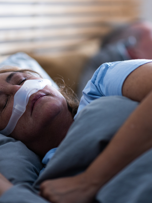 Obstructive sleep apnea in adults - sleeping patient (female)